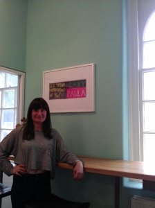 artist Paula Bourke-Girgis with one of her sketchbook pages at the Chelsea College of Art & Design Cafe